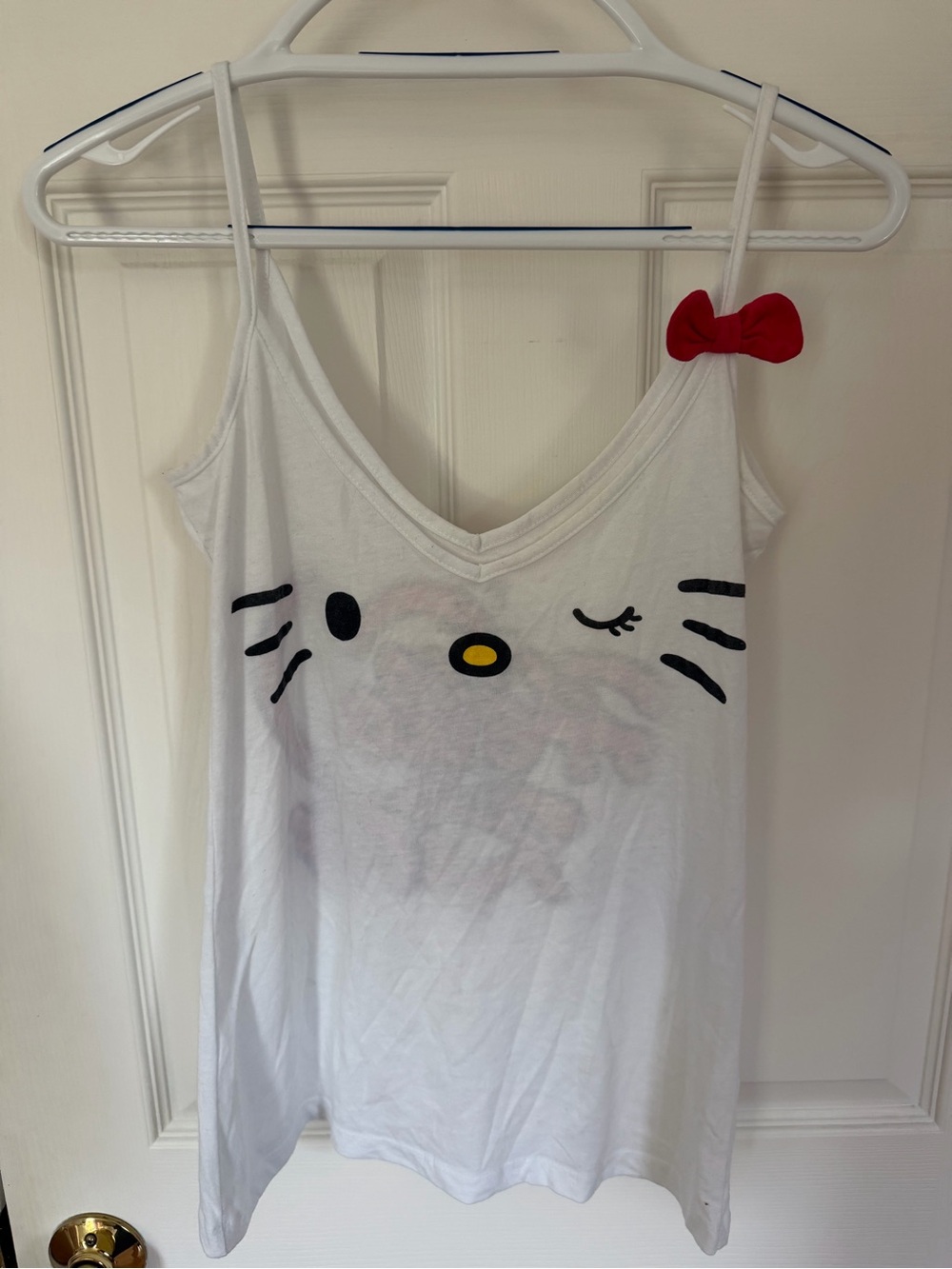 Hello Kitty Winking Face White Cotton Tank with Red Bow Accent
